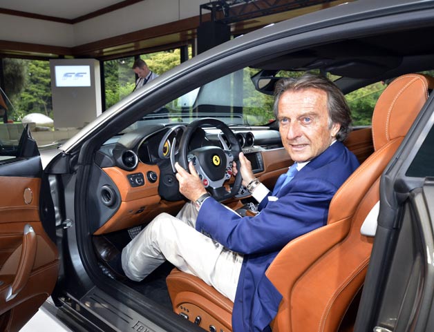 Luca Cordero di Montezemolo sitting in new Ferrari
