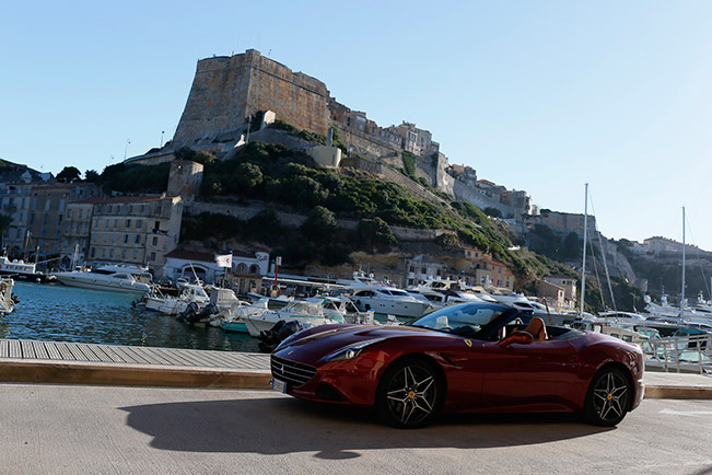 Two Ferraris Amid the Sails